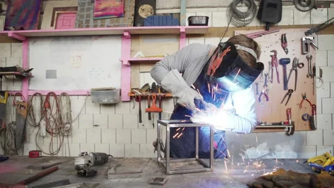 Professional metalworker using welding torch Stock Footage 142335190