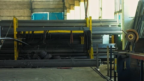 Professional metalworkers working at the factory storage together Stock Footage 89511047