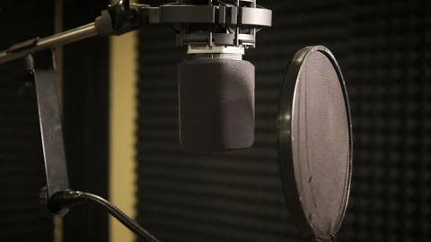 Professional microphone in the recording studio, microphone near wall with Stockbeeldmateriaal 125205777