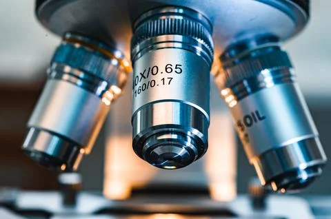 Professional microscope in laboratory, science equipment and medical tools .. Photos