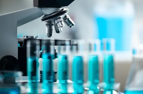 Professional microscope in laboratory, science equipment and medical tools .. Фото