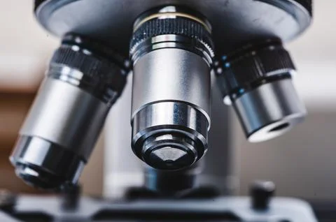 Professional microscope in laboratory, science equipment and medical tools .. Фото