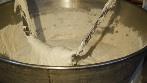 Professional mixer during process of kneading dough on bread factory Vídeo Stock 146228031