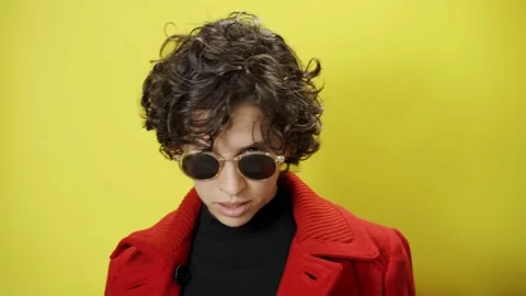 Professional model enter frame with style and cool looks and gestures to camera Stock Footage 147331644