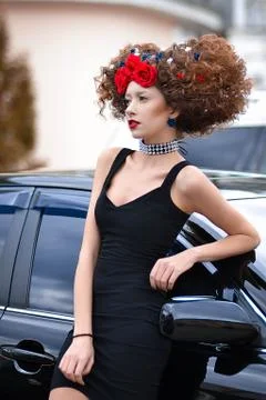 Professional model in short black dress. Stock Photos