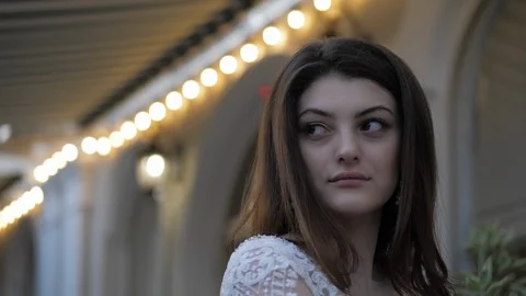 Professional model in white lacy dressing poses for camera Video stock 126598689