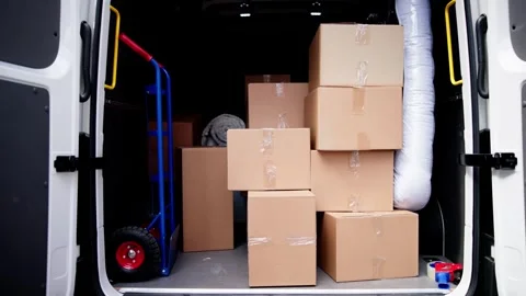 Professional Movers Delivering Packed Boxes From Business Relocation Service Stock Footage 279800267
