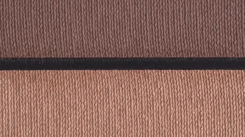Professional multicolor eyeshadow makeup palette, top view. Macro texture o.. Stock Footage 260240862