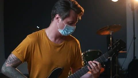 Professional music studio. Man playing guitar. Life of musicians throughout the Stock Footage 138652784
