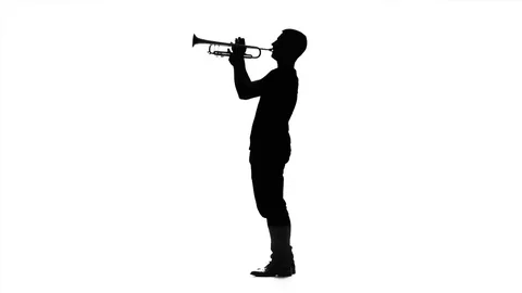 Professional musician playing on trumpet in slow motion. Black silhouette Stock Footage