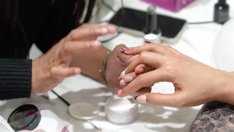 Professional Nail Art Using Powder and Fine Brush Detailing Stock Footage 325528861