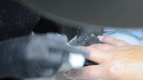 Professional nail technician using a manual nail file to remove old gel polish 動画素材 340815950