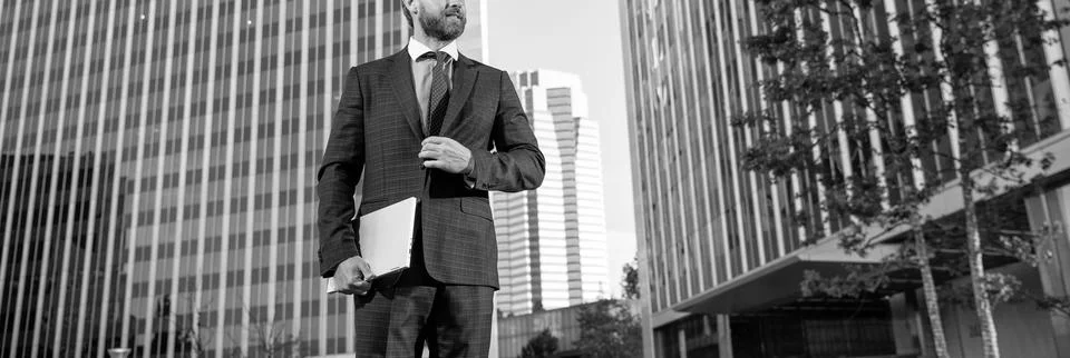 Professional network administrator hold computer. boss with modern laptop. copy Stock Photos