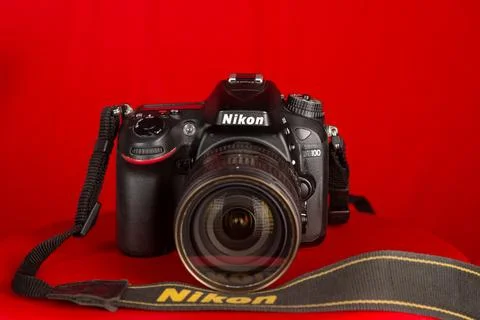 A professional Nikon brand camera, model D7100 with Nikkor 16-85mm f/3.5 lens Stock Photos