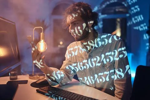 Professional occupation of guy working on computer and using phone Stock Photos