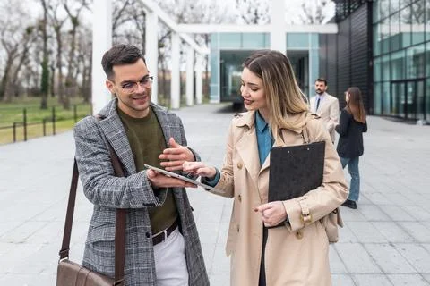 Professional occupation, office workers. Two business people meet before st.. Stock Photos