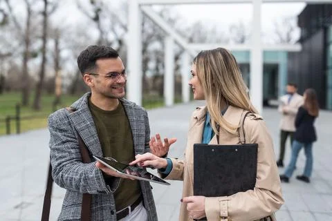 Professional occupation, office workers. Two business people meet before st.. Stock Photos
