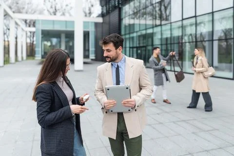 Professional occupation, office workers. Two business people meet before st.. Stock Photos