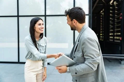 Professional occupation, office workers. Two business people meet before st.. Stock Photos