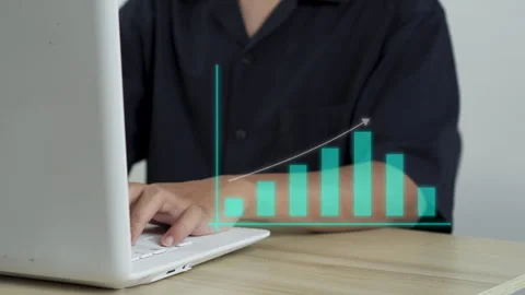 Professional operating laptop while analyzing financial business growth metrics 스톡 동영상 345090827