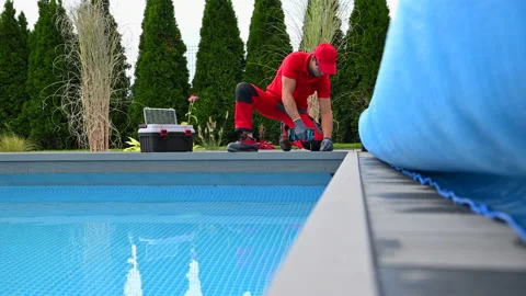 Professional Outdoor Swimming Pools Worker Finishing Composite Deck Installation Stock Footage 213616459