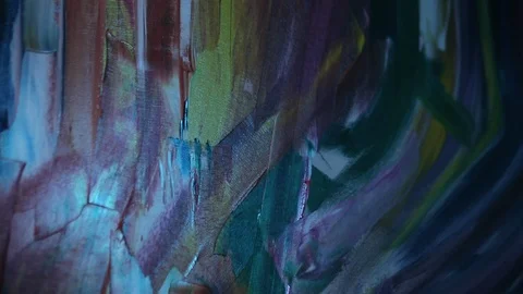 Professional painter using palette knife for fine detail on large canvas Video stock 99998811