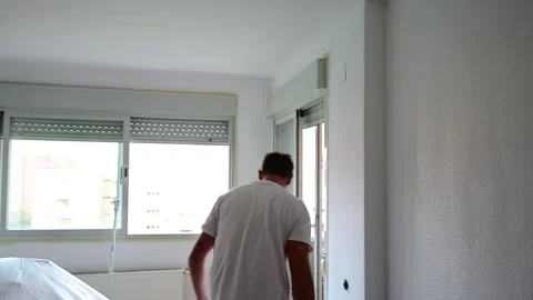 Professional painter working on interior wall renovation 動画素材 341362923