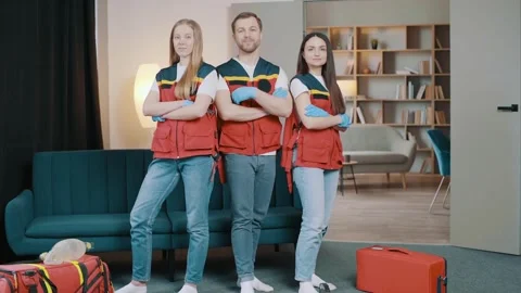 Professional Paramedics Look at Camera Video stock 255704079