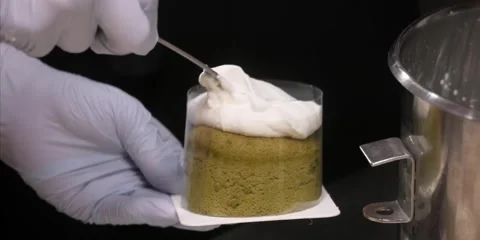 Professional Pastry Chef Applying Whipped White Cream To Mini Matcha Green Tea S 스톡 동영상 343588922