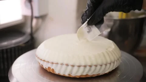 Professional Pastry Chef Decorating Gourmet Lemon Meringue Tart with White Cream Stock Footage 337751463