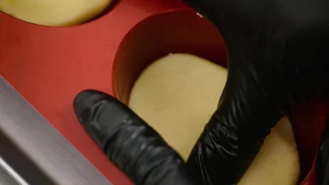 Professional Pastry Chef Hands in Black Gloves Pressing Shortcrust Dough into Re Stock Footage 337751600