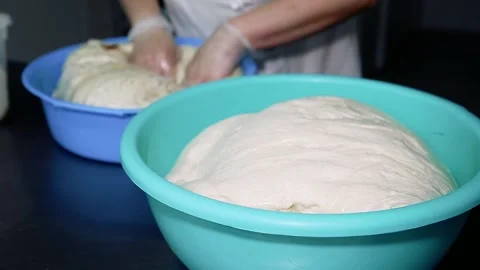 Professional pastry chef or baker prepares the dough Stock Footage 209146079