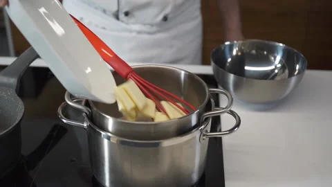 Professional Pastry Chef in a Restaurant Kitchen is preparing a Dessert. Stock-Footage 143415334