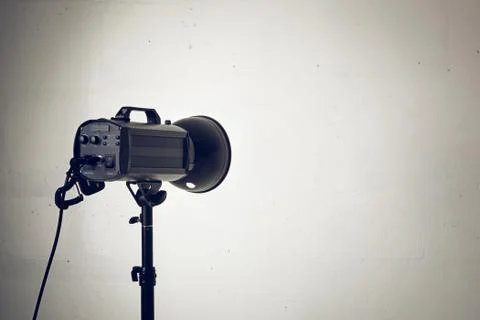Professional photo studio strobe with reflector. Stock Photos