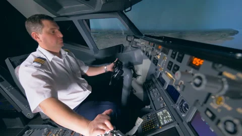 Professional pilot flies a plane simulator, close up. Stock Footage 97957676