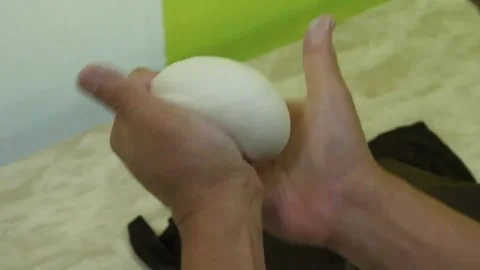 Professional Pizza Chef Hands Kneading Raw Italian Dough on Wooden Table Stock Footage 337676724