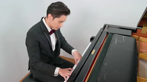 Professional playing piano in the studio Video stock 168014982