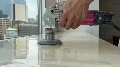 Professional polishing of a marble top using an angle grinder Stock Footage 242402330