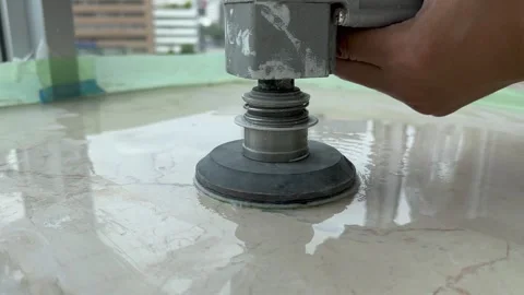 Professional polishing of a marble top using an angle grinder Stock Footage 242402338