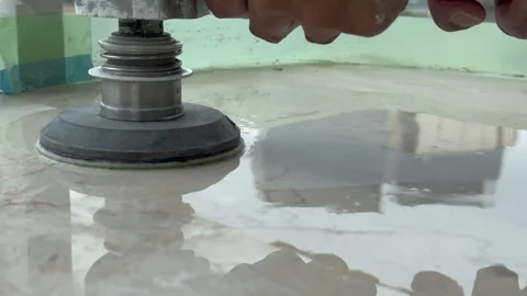 Professional polishing of a marble top using an angle grinder Stock Footage 242656671
