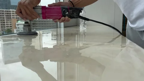 Professional polishing of a marble top using an angle grinder Stock Footage 242834986