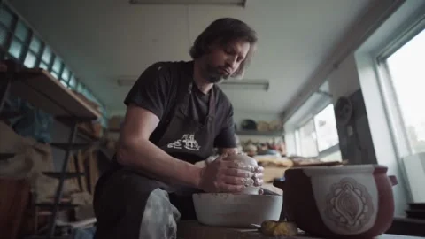 Professional potter working with a clay. Ceramics studio. Stock Footage 150708207
