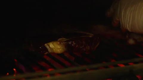 The professional process of cooking meat on the grill. Stock Footage 232562340