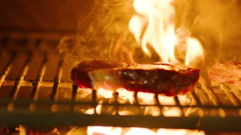 The professional process of cooking meat on the grill. Stock Footage 232562687
