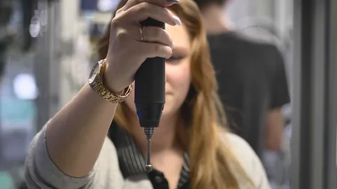 Professional Production Operator is Screwing the Component in the Assembly Line 動画素材 127029661