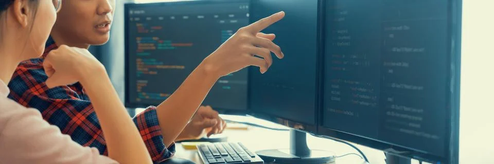 Professional programer team discuss about web coding at office. Burgeoning. Stock Photos