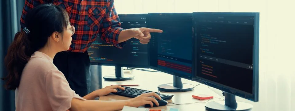 Professional programer team discuss about web coding at office. Burgeoning. Stock Photos