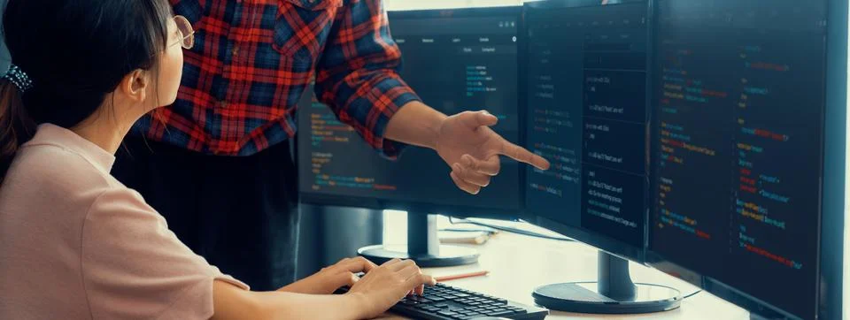 Professional programer team discuss about web coding at office. Burgeoning. Stock Photos