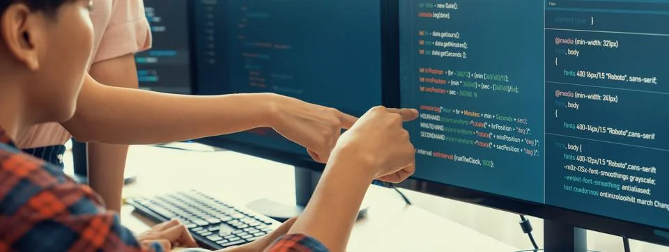 Professional programer team discuss about web coding at office. Burgeoning. Stock Photos
