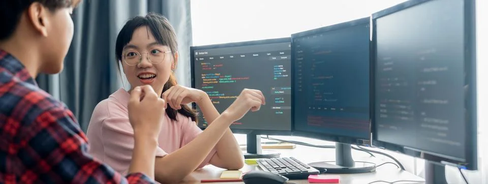 Professional programer team discuss about web coding at office. Burgeoning. Stock Photos